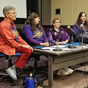 Four homecare workers wearing 'Care Power' t-shirst